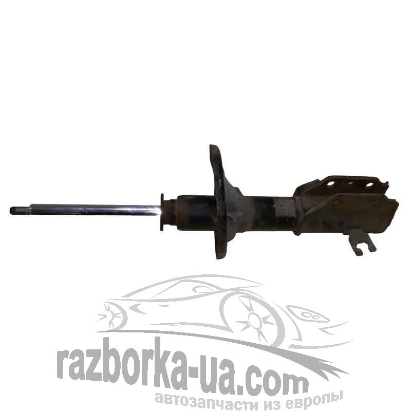 Амортизатор задний Mazda 323 BA (1994-1998) левый фото Амортизатор задний Mazda 323 BA (1994-1998) левый фото