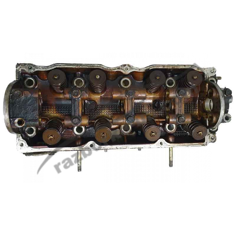 Головка блока цилиндров двигателя Kia Sportage 2.0 8V (1998-1999) фото